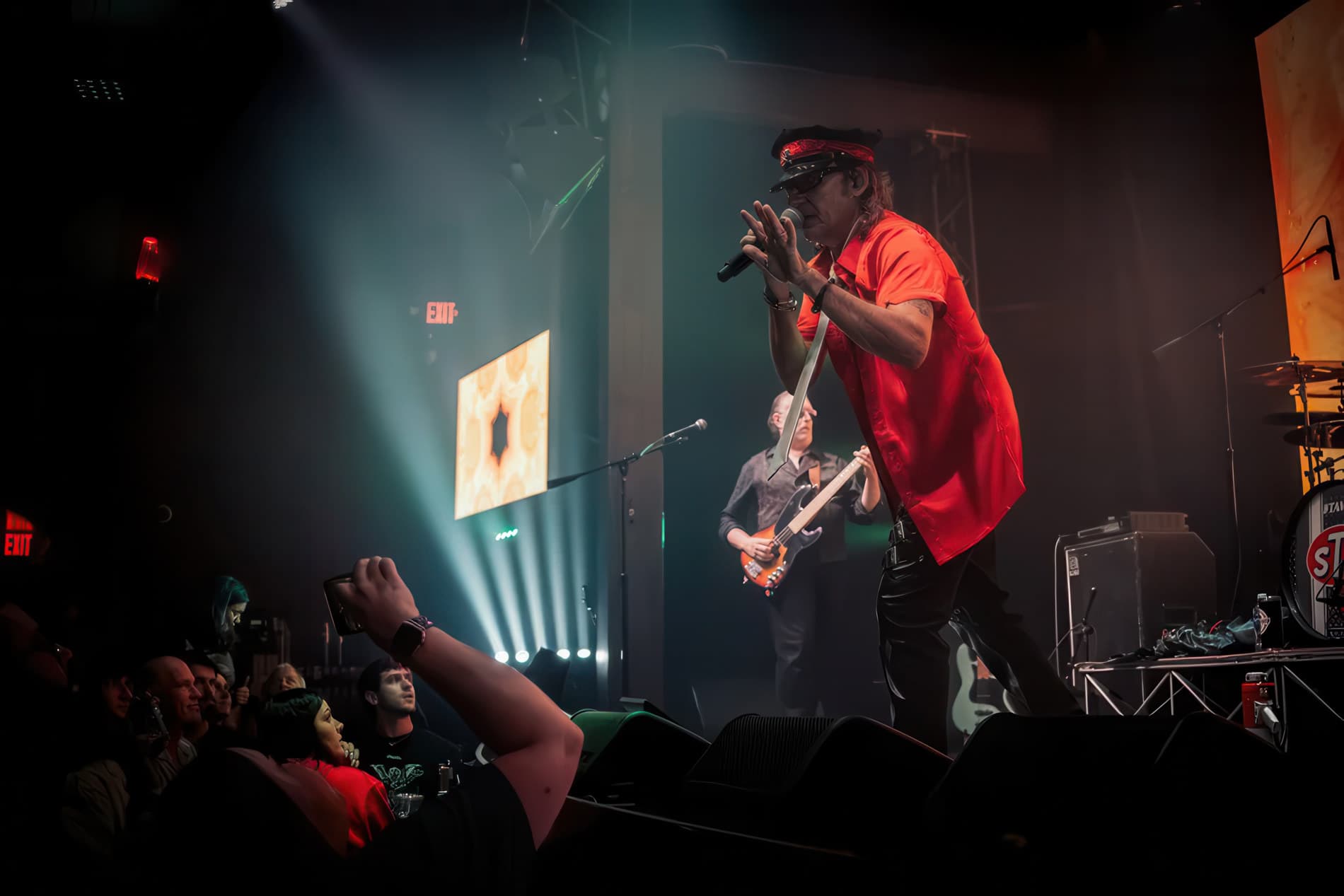 High-energy stage moment for private restaurant event atmosphere